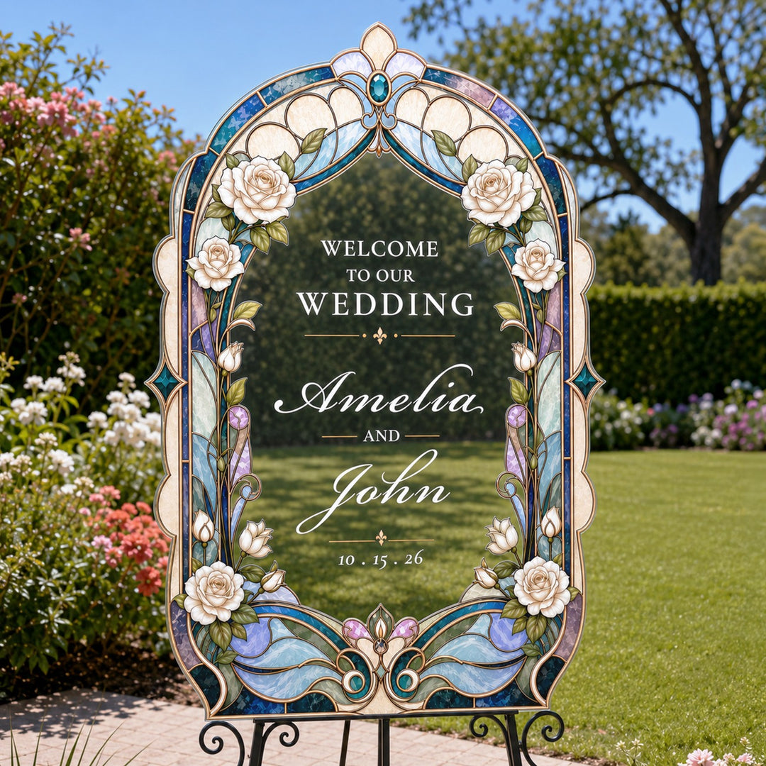Decorative wedding sign with floral frame in a garden setting. Vintage Art Nouveau White Rose Stained Glass Wedding Welcome Sign. Silver mirror acrylic custom wedding sign.