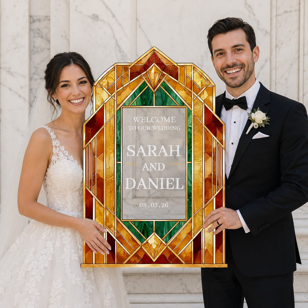Man and woman holding a decorative wedding sign with 'Welcome to our wedding' text. Amber art Deco Geometric Stained Glass Wedding Welcome Sign. Clear acrylic wedding sign.