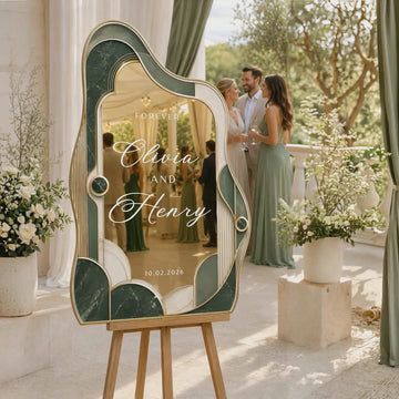 Personalized emerald green wavy shape wedding sign on easel at outdoor garden ceremony. Product video.